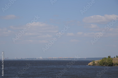 Panorama of the city from the bank of the river in summer. Russia.