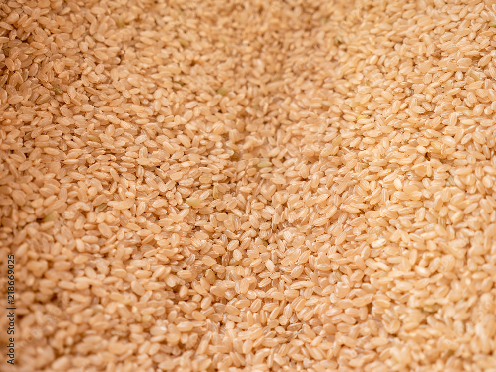 lot of brown rice texture, food background. lot of brown rice texture, food background.
