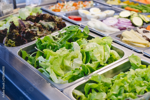 salad bar with vegetables in the restaurant, healthy food photo