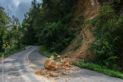 Thailand, Chiangrai - Chiangmai road. Rockfall after the flood photo