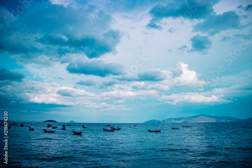 Blue sky and view on fishing boats in Vietnam