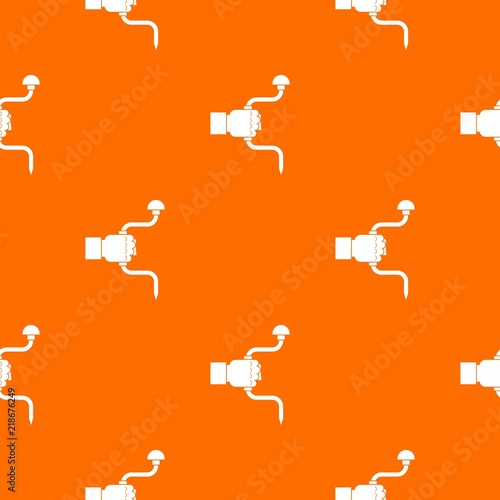 Vintage hand drill in man hand pattern repeat seamless in orange color for any design. Vector geometric illustration