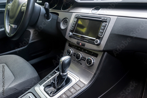 Car interior with automatic transmission lever, closeup © RomanR