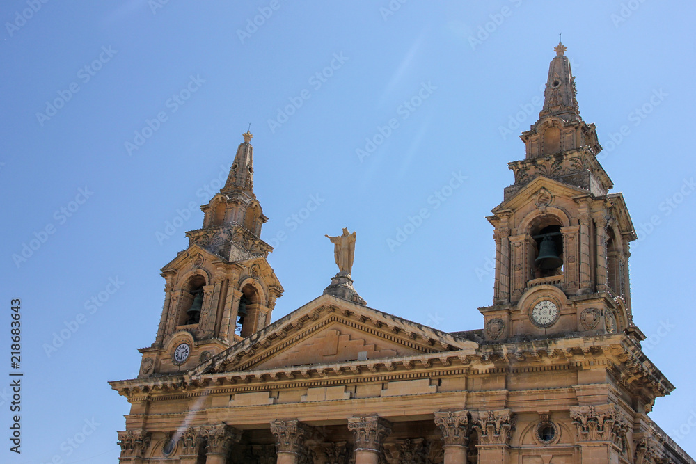 Top part of facade of St. Publius' Church in Floriana Malta