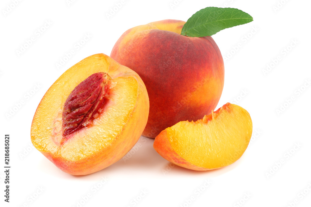 peach fruit with green leaf and slices isolated on white background peach fruit with green leaf and slices isolated on white background
