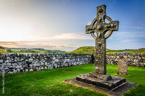 Fototapeta Stone religious celtic Kildalton cross on a cemetary beside a church on Islay is