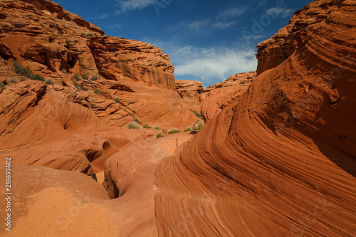 Scenic colorful canyon landscape with beautiful clouds in the sky. Beauty of American southwest. Slot canyon in Page, Arizona