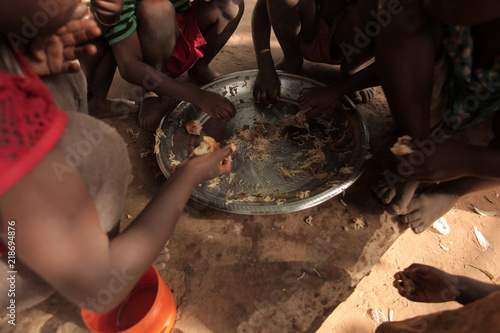 african lunch - hand with food