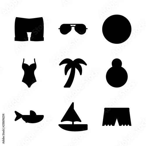 beach vector icons set. shark, sunglasses, sailboat and swimsuit in this set