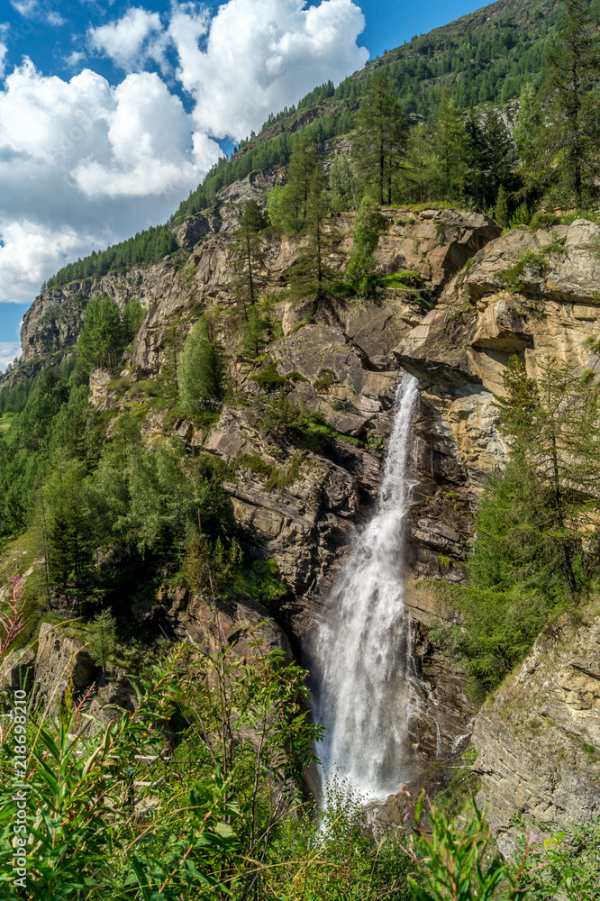 waterfall in the mountains among the rocks