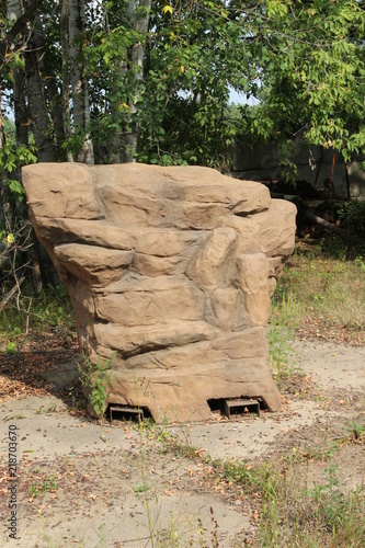 large rock with holes