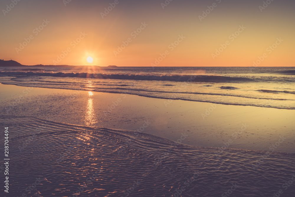 Fototapeta premium Golden sunrise over the ocean, NSW, Australia