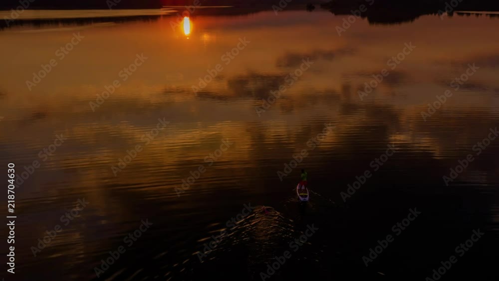 Reflection of orange sunrise at the lake Reflection of orange sunrise at the lake