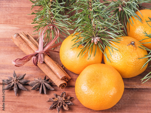 Christmas composition with fir branches, mandarins