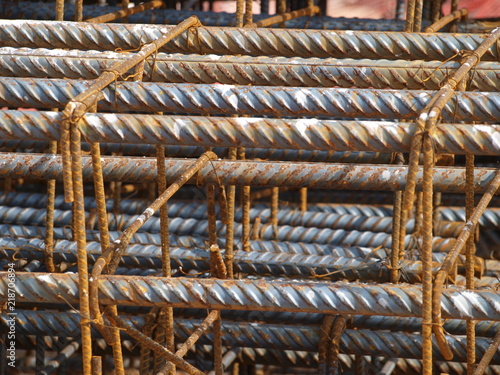 Rebar cages all tied and ready to be placed into forms for concrete pour at job site. 