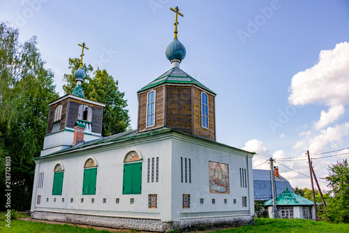 Obolenskoe, Russia - August 2018: The Old church Assumption of the Blessed Virgin Mary of the 18th century in the village of Obolenskoe. Kaluzhskiy region, Zhukovskiy district photo