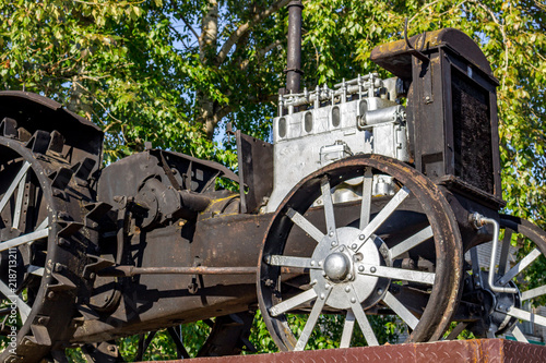 Monument to the first tractor in the village of Vysokinichi, Russia. Kaluzhskiy region, Zhukovskiy district
 photo