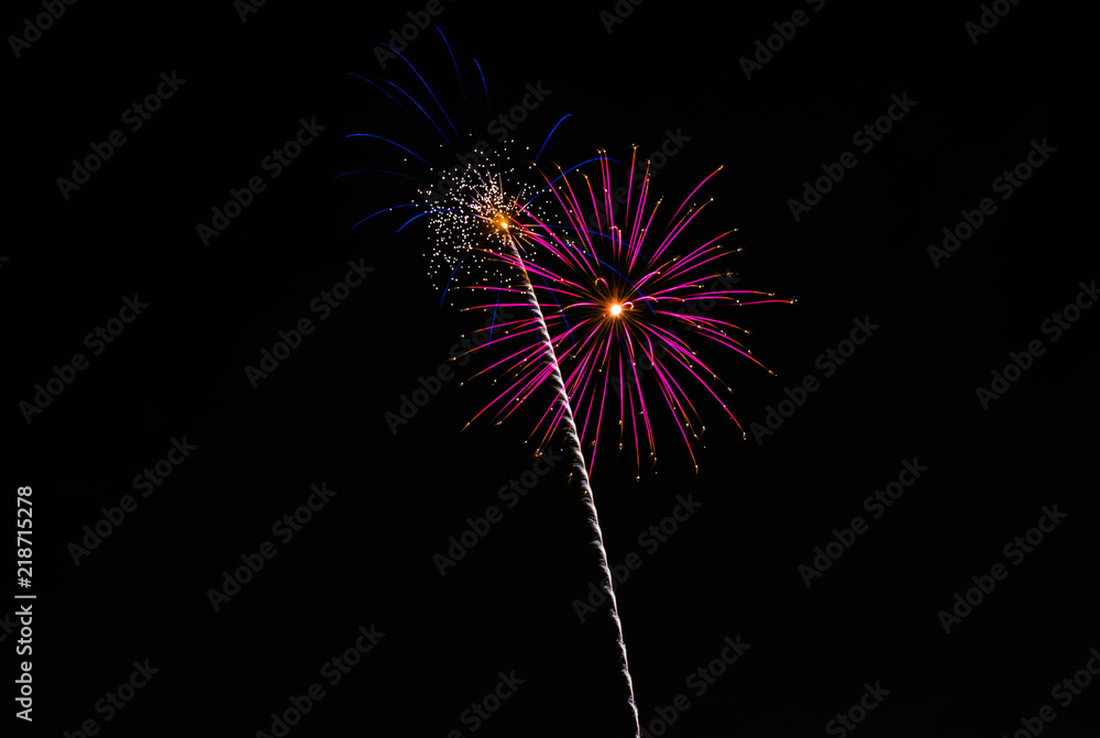 Purple firework exploding with star trail Purple firework exploding with star trail