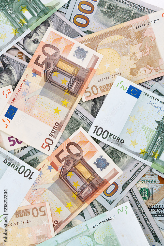 A lot of euro and american dollars banknotes. Background