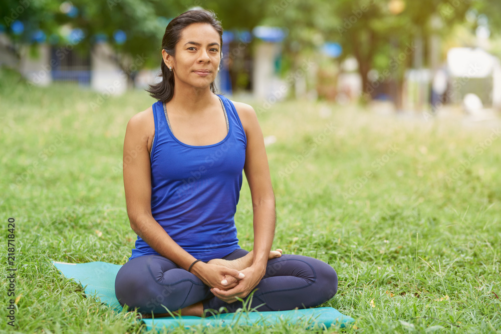 Young woman sit in relax pose Young woman sit in relax pose