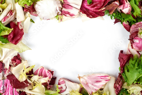 Frame of healthy vegetarian salad isolated on the white background