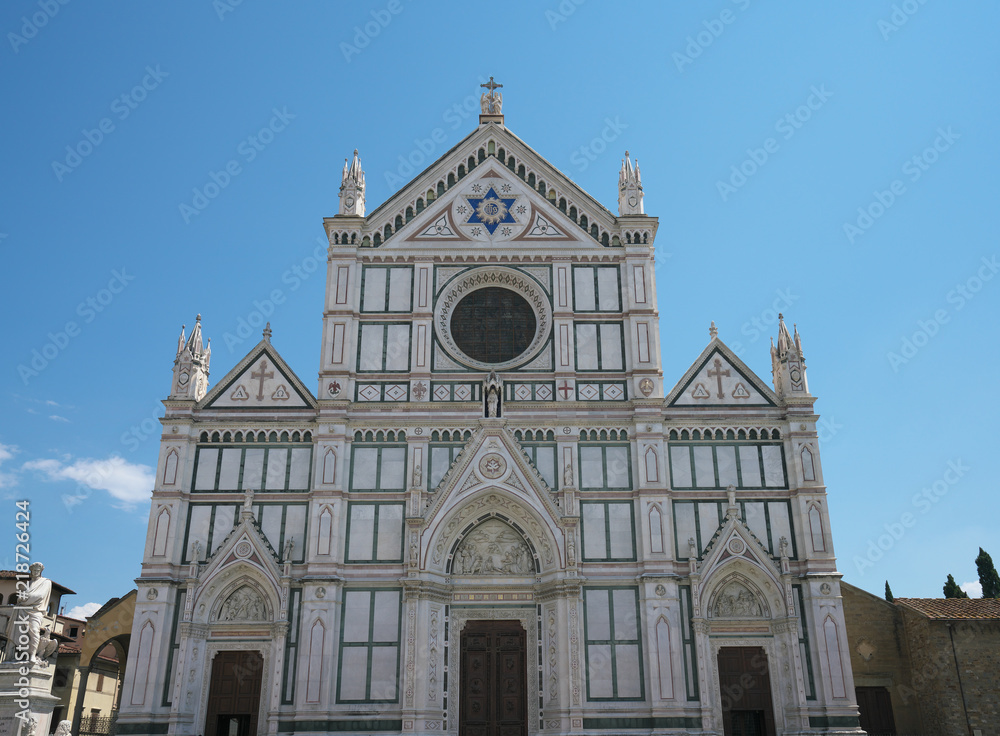 Florence,Italy-July 26,2018: Piazza Santa Croce and Basilica di Santa Croce di Firenze in the blazing midday sun