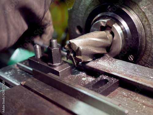 Old geeen milling machine, closeup, metalworking