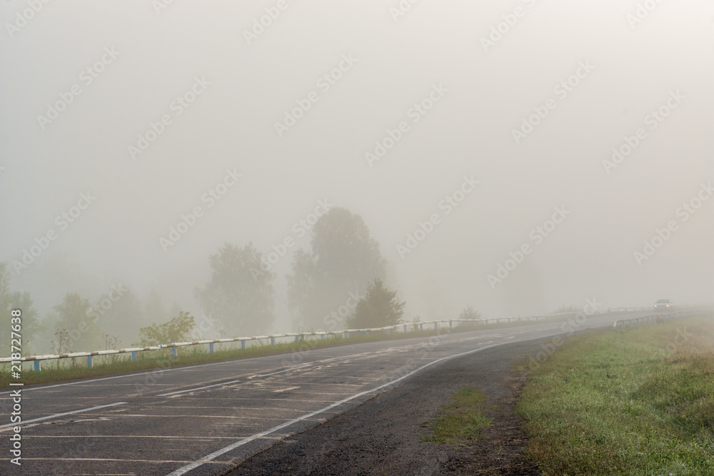 picturesque view of highway on hill with mountains on background
picturesque view of highway on hill with mountains on background