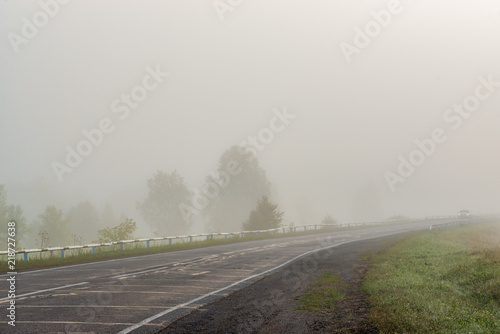 picturesque view of highway on hill with mountains on background 