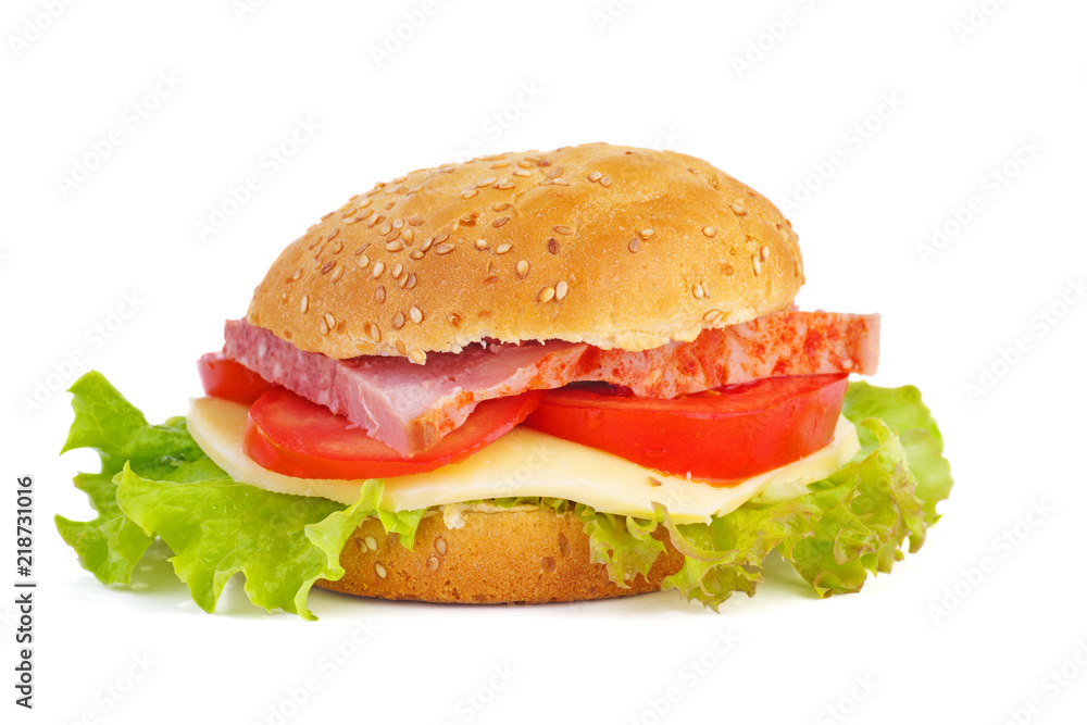 Homemade hamburger with ham, cheese, tomato and lettuce Homemade hamburger with ham, cheese, tomato and lettuce