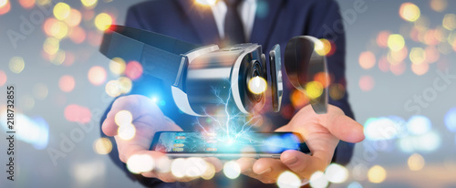Billede på lærred Businessman using virtual reality glasses technology 3D rendering