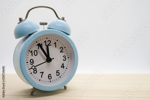 Alarm clock, five minutes to twelve