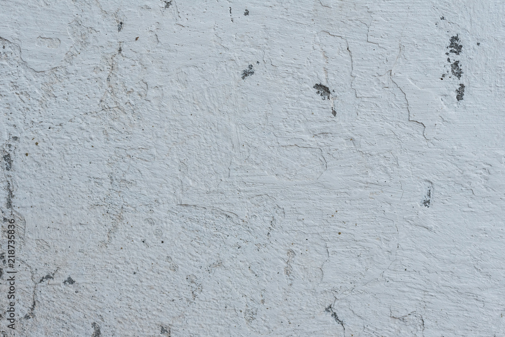 Wall fragment with scratches and cracks. It can be used as a background Wall fragment with scratches and cracks. It can be used as a background