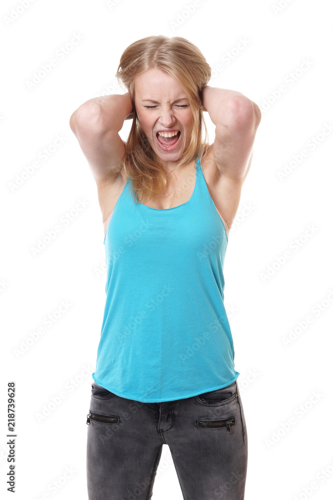 screaming young woman in despair holding her head screaming young woman in despair holding her head