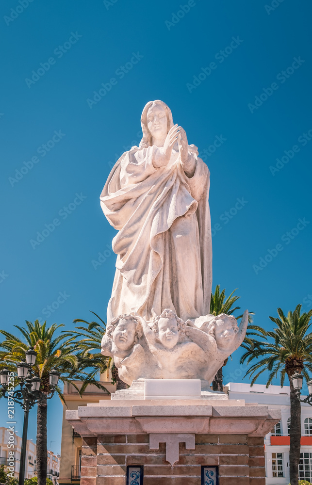 White stone statue of the Virgin Mary a monument to the immaculate conception 