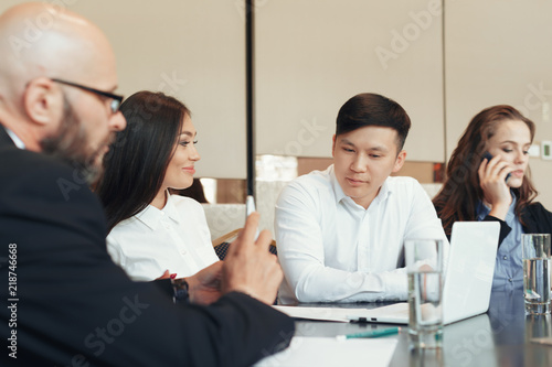 Business people working together at conference table
