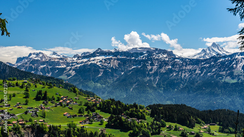 Switzerland, Beatenberg village and Alps view 