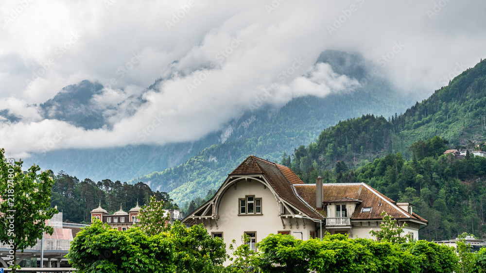 Switzerland, Interlaken scenic view on foggy mountains