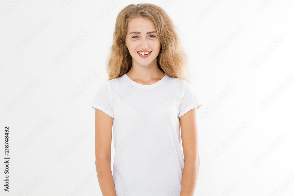 Young caucasian blonde girl isolated on white background. Copy space. Mock up. Summer woman clothes blank template white t shirt. Perfect skin. Skincare and makeup concept. Young caucasian blonde girl isolated on white background. Copy space. Mock up. Summer woman clothes blank template white t shirt. Perfect skin. Skincare and makeup concept.