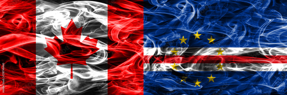 Obraz premium Canada vs Cape Verde smoke flags placed side by side. Canadian and Cape Verde flag together