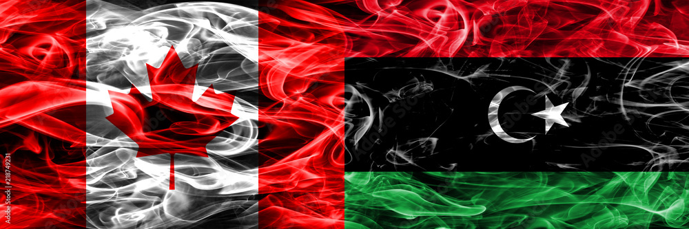 Canada vs Libya smoke flags placed side by side. Canadian and Libya flag together Canada vs Libya smoke flags placed side by side. Canadian and Libya flag together