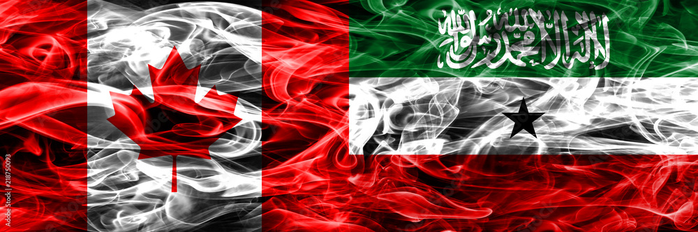 Canada vs Somaliland smoke flags placed side by side. Canadian and Somaliland flag together