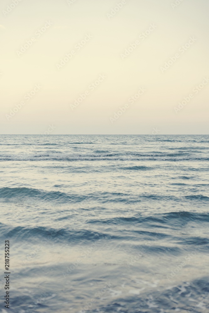 Waves on a wide blue sea