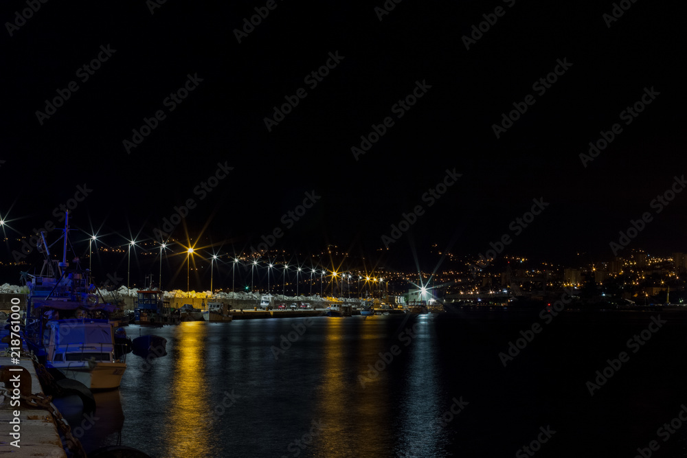 night harbor with lanterns alley way