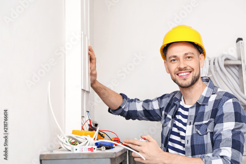Electrician repairing distr...