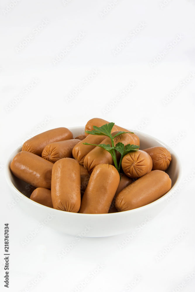 Raw appetizer sausages served in a bowl Raw appetizer sausages served in a bowl