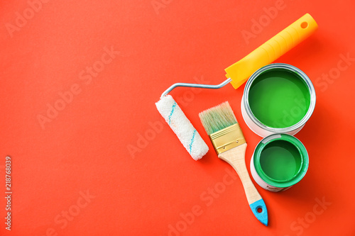 Paint cans with roller and ...