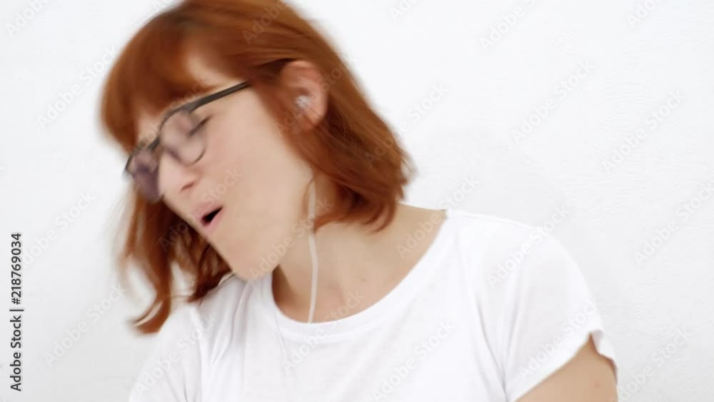 cute young teenager girl in bed taking photos with mobile phone. cute young teenager girl in bed taking photos with mobile phone.