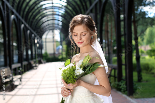 Beautiful young bride with ...