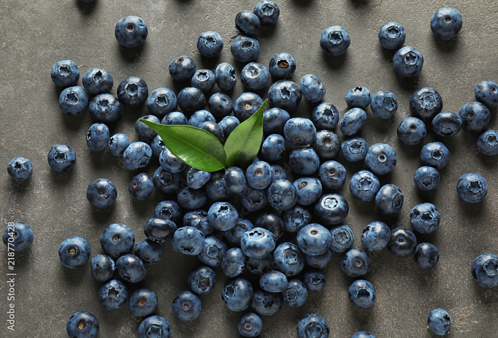 Ripe blueberries on grey background Ripe blueberries on grey background